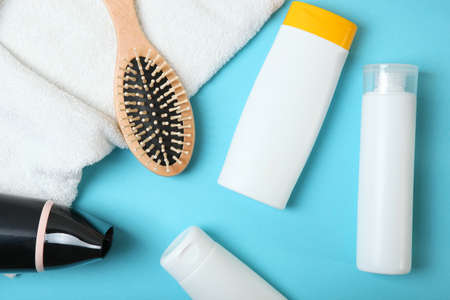 hair care products and comb on the table top view.の写真素材