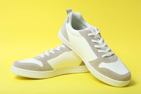 womens sneakers on a colored background. Womens shoes.