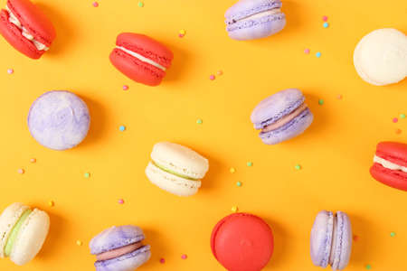 macaroons on a colored background top view.の写真素材