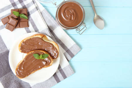 Toast with chocolate paste on the table.の写真素材