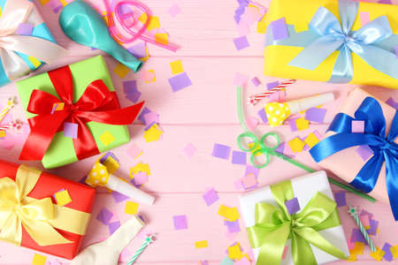 gifts on a colored background top view. Holiday, giving presents, birthday.の写真素材