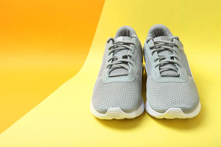 mens sneakers on a colored background. mens footwear. minimalismの写真素材
