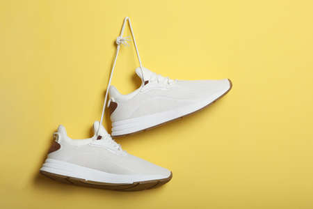 mens sneakers on a colored background. mens footwear. minimalism