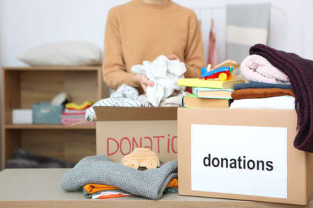 boxes with donations with the necessary things on the table
