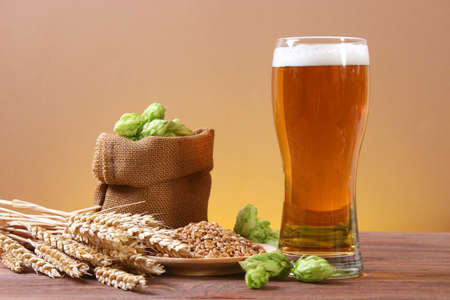 Beer, wheat and hops on the table.の写真素材