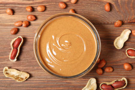 creamy peanut butter on the table. Peanut paste.
