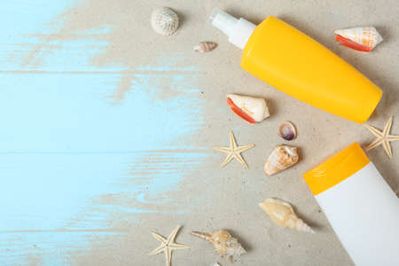 sand, shells, starfish and sun protection products.の写真素材