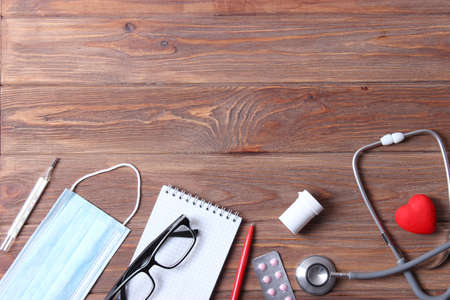 Doctors desk top view. Set of different doctor accessories.の写真素材