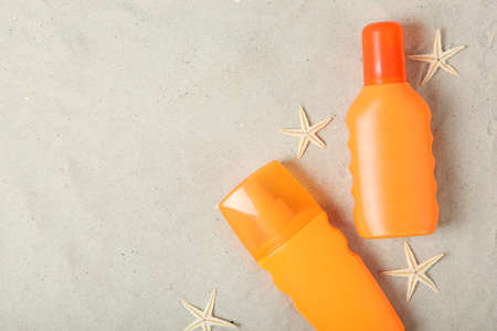 sand, shells, starfish and sun protection products.の写真素材