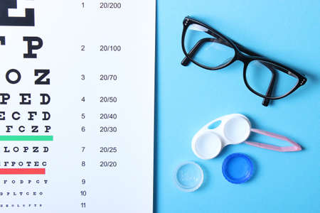 table for checking vision, glasses and lenses for correcting vision