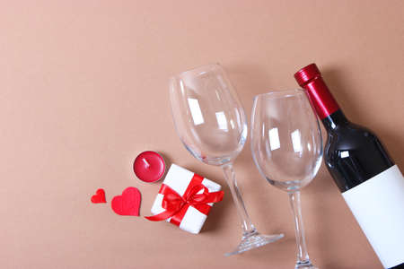 red wine and roses on the table. Valentines day background.の写真素材