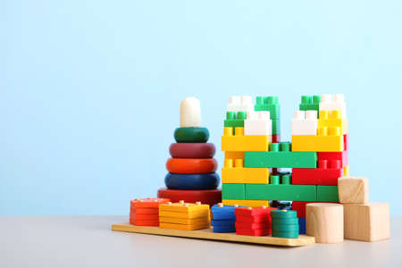 Set of different childrens toys on a colored background. A place to insert textの写真素材