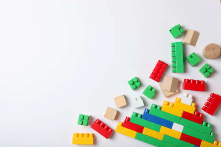 Set of different childrens toys on a colored background top view.の写真素材