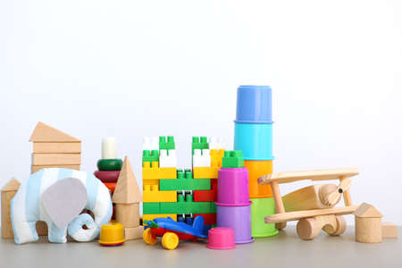Set of different childrens toys on a colored background. A place to insert textの写真素材