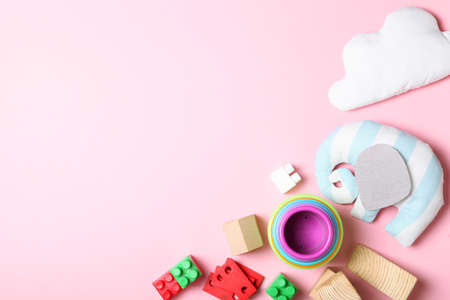 Set of different childrens toys on a colored background top view.の写真素材