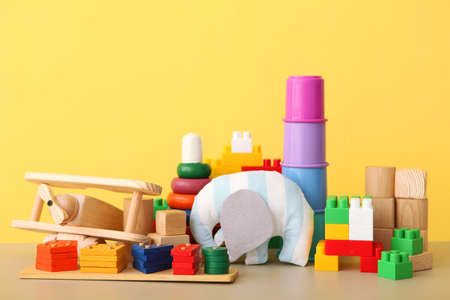 Set of different childrens toys on a colored background. A place to insert textの写真素材