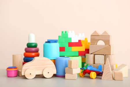 Set of different childrens toys on a colored background. A place to insert textの写真素材