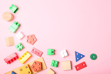 Set of different childrens toys on a colored background top view.の写真素材