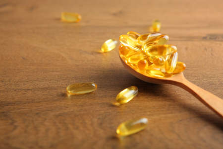 Omega 3 capsules on the table close-upの写真素材