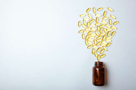 Omega 3 capsules on a white background with place for text.の写真素材