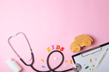 Pediatrics concept. Stethoscope and toy on a light backgroundの写真素材