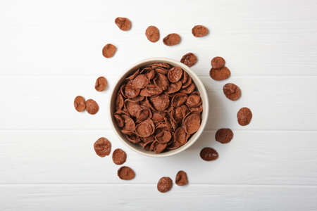 chocolate cornflakes for breakfast on the table close-upの写真素材
