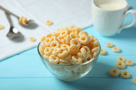 Corn rings in glaze for breakfast on a colored background.の写真素材
