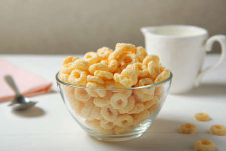 Corn rings in glaze for breakfast on the table with a rat planの写真素材