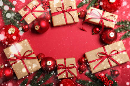 Christmas decorations and gifts on a colored background top viewの写真素材