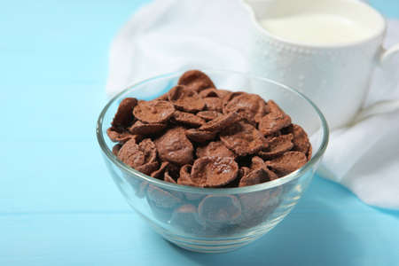 chocolate cornflakes for breakfast on the table close-upの写真素材