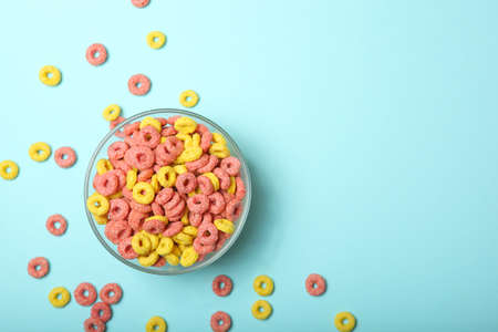 colored corn rings for breakfast on the table close-upの写真素材