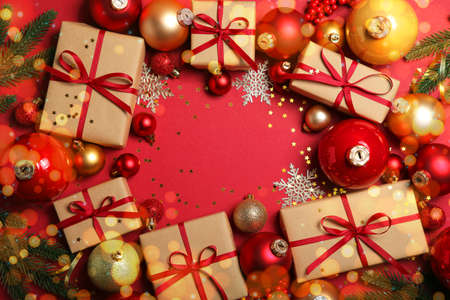 Christmas decorations and gifts on a colored background top viewの写真素材