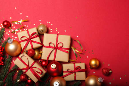 Christmas decorations and gifts on a colored background top viewの写真素材