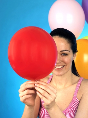 Young Woman Holding a Balloonの写真素材