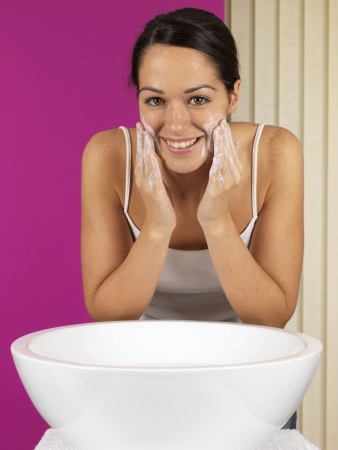 Young Woman Washing Faceの写真素材