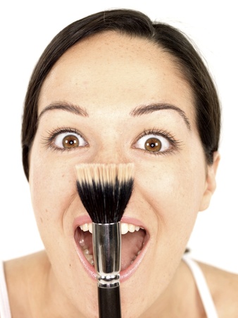 Young Woman Applying Blusherの写真素材