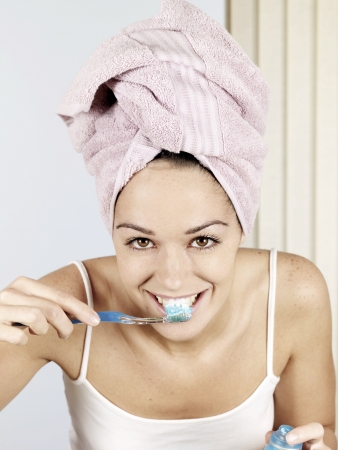 Young Woman Brushing Teethの写真素材