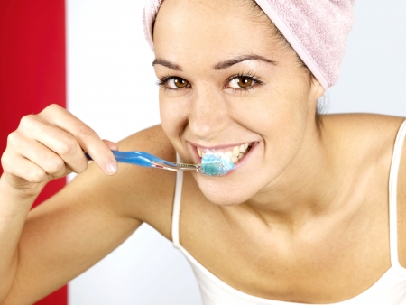 Young Woman Brushing Teethの写真素材