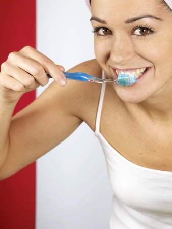 Young Woman Brushing Teethの写真素材