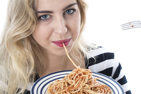  Attractive Young Woman Eating Spaghettiの写真素材