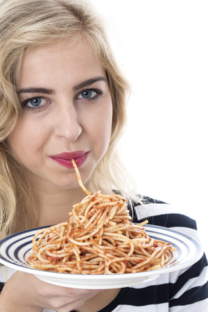  Attractive Young Woman Eating Spaghettiの写真素材