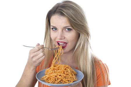  Attractive Young Woman Eating Spaghetti Pastaの写真素材