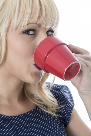 Model Released. Attractive Young Woman Drinking a Cup of Coffeeの写真素材