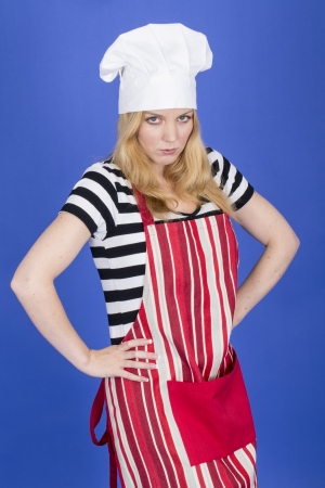 Model Released. Angry Young Woman in Chefs Hat and Apronの写真素材