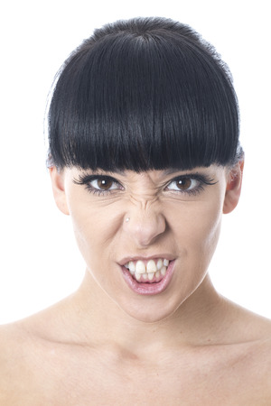 Angry Young Woman Pulling a Faceの写真素材