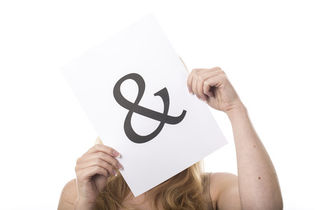 Model Released. Young Woman Holding And Signの写真素材