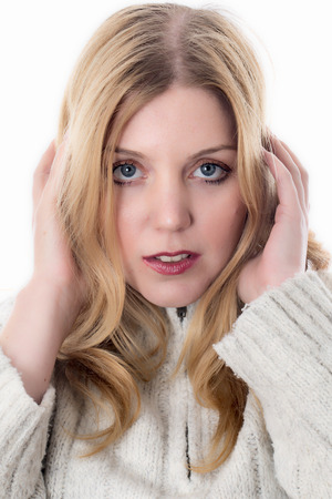 Model Released. Happy Young Woman Wearing a Woolen Jumperの写真素材