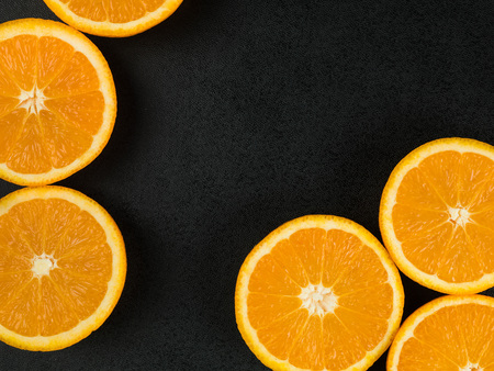 Fresh Ripe Natural Healthy Oranges On A Black Backgroundの写真素材