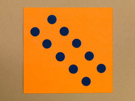 Purple Spots on an Orange Background With Copy Space