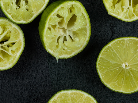 Fresh Squeezed Ripe Juicy Limes With Copy Spaceの写真素材
